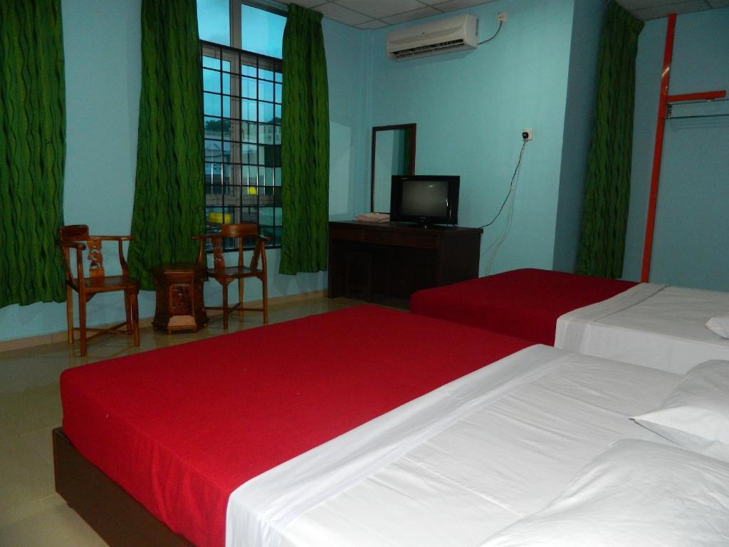 River Side Hotel Mersing Quarto foto