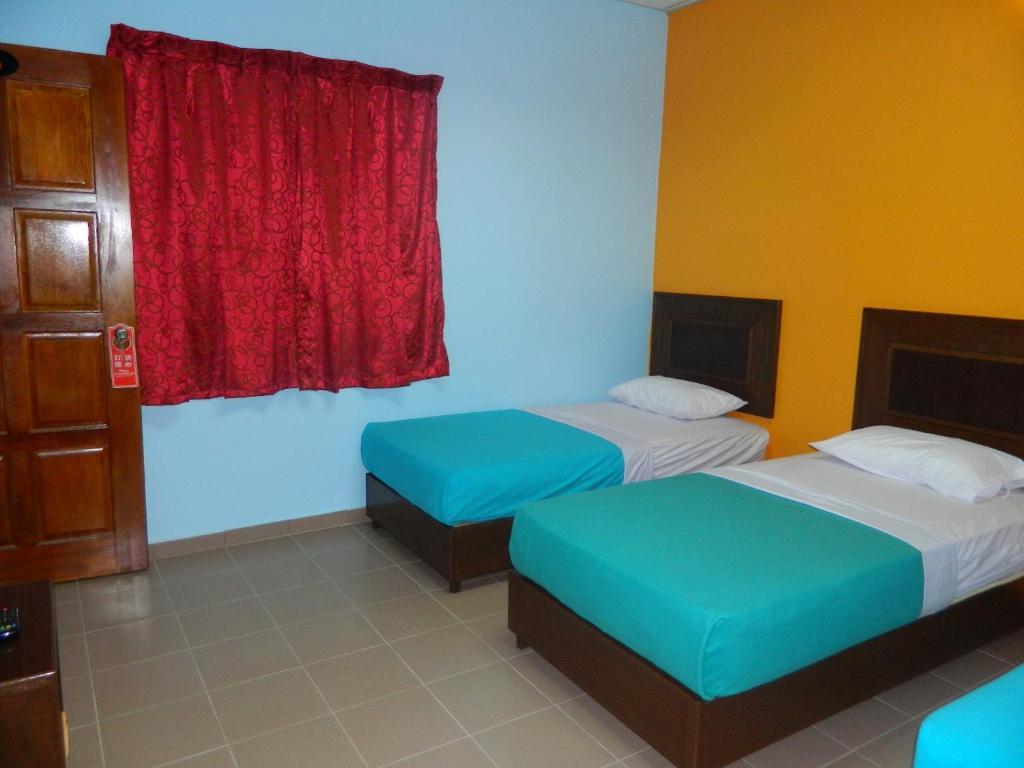 River Side Hotel Mersing Quarto foto